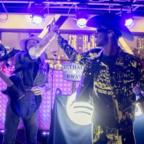 Lil Nas X, right, and Billy Ray Cyrus celebrate af