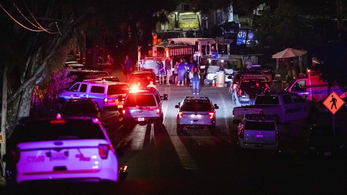 Police vehicles arrive on the scene of the investigation following a deadly shooting at the Gilroy Garlic Festival in Gilroy, 80 miles south of San Francisco, Calif. on July 28, 2019.