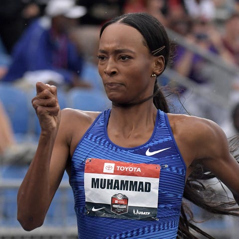 Dalilah Muhammad ran a time of  52.20 seconds...