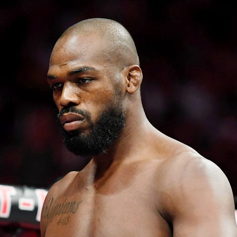 Jon Jones  is charged with battery after an...