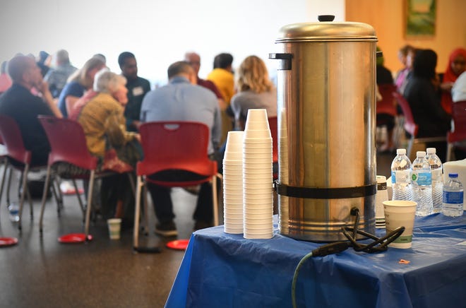 Somali-style tea is served during a Dine and Dialogue event Saturday, July 20, 2019, at the St. Cloud Public Library. 