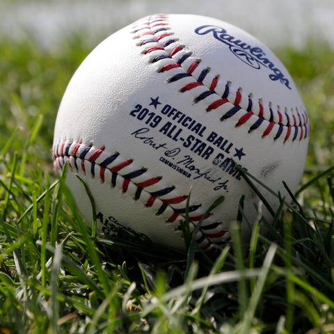 A baseball is pictured as the American League...