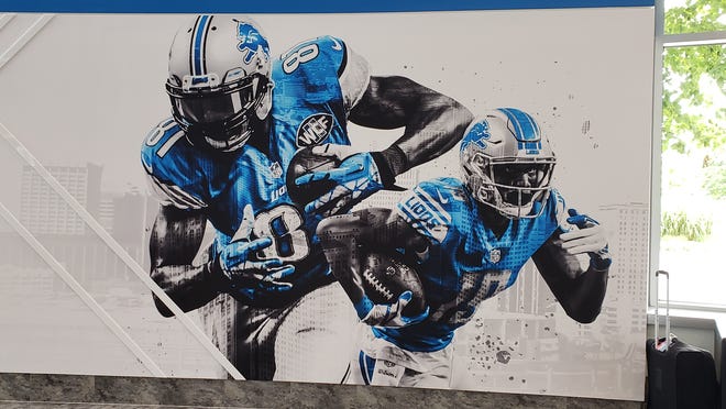 Kenny Golladay is featured on a mural with Calvin Johnson at the Lions' practice facility.