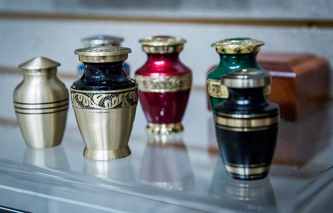 A reader asks about cremation services available in Asheville, and regulations. This file photo shows urns for cremains.