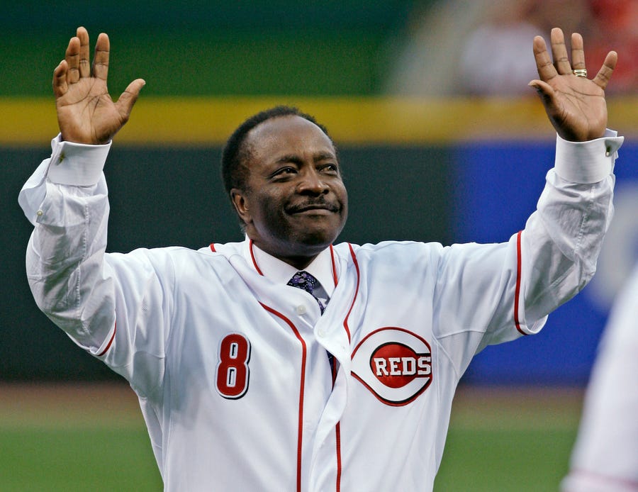 Cincinnati Reds Hall of Fame second baseman Joe Morgan acknowledges the crowd after throwing out a ceremonial first pitch prior to the Reds' baseball game against the St. Louis Cardinals, Wednesday, April 7, 2010, in Cincinnati.