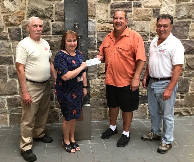 The South Jersey Cruisers Association Car Club recently presented a check to the New Jersey Veterans Memorial Home in Vineland for its activity fund. The donation represented the proceeds from the club’s Patriot’s Pride Car Cruise, which was held in July on the grounds of Saint Anthony’s Greek Orthodox Church Hall. Pictured at the presentation are (from left) Jim Solomon, 50/50 co-coordinator, South Jersey Cruisers Association; Lisa Williams, activities supervisor, New Jersey Veterans Memorial Home; Harry Lombardo, 50/50 co-coordinator, South Jersey Cruisers Association; and Ben Notaro, spokesperson, South Jersey Cruisers Association.