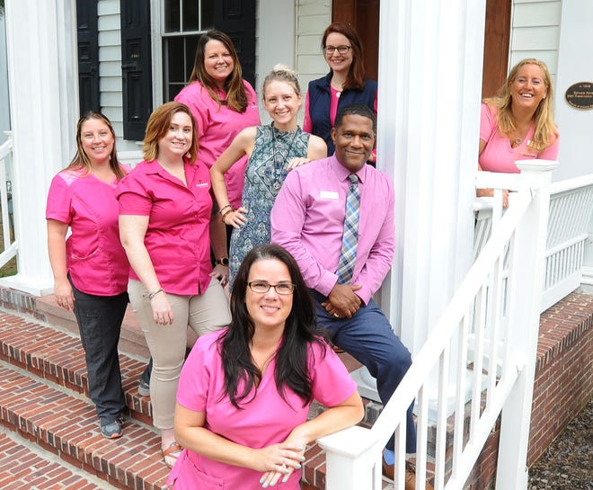 WIL NURSE NEXT DOOR -  Allison Brooks, (right) Executive director of Nurse Next Door with some of her staff at their office on Main St. in Camden.  Nurse Next Door is one of the winners for medium size Top Workplace award.   GARY EMEIGH /Special To The News Journal