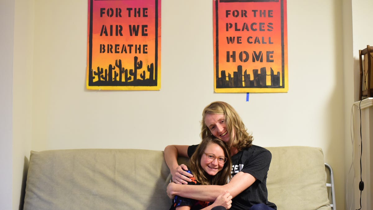 Lauren Maunus(right) and Revelle Mast(left) pose in their office space at Sunrise Movement, a youth-led movement advocating political action on climate change, in Washington, D.C.