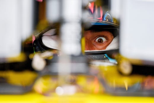 Australian Formula One driver Daniel Ricciardo of Renault sits in his car during the first practice session of the Hungarian Formula One Grand Prix at the Hungaroring circuit, in Mogyorod, Hungary, on August 2, 2019.