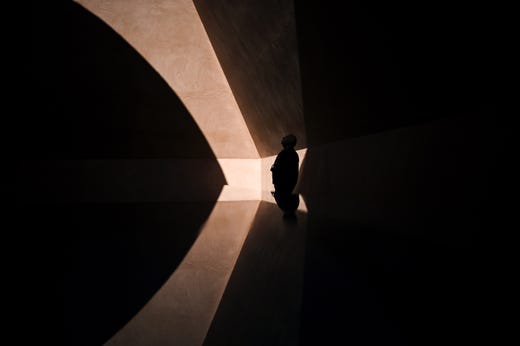 A tourist walks through the 'Within Without' Skyspace by American artist James Turrell at the National Gallery of Australia in Canberra, Australia on August 2, 2019.