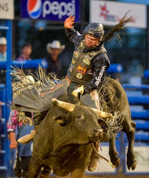 Dakota Louis attempts to ride Chili Bean in the bull riding event during the Big Sky Pro Rodeo Roundup at the Montana State Fair in 2019. The Browning bull rider moved into the top 35 in the PBR standings after the Unleash The Beast event in Billings last weekend.
