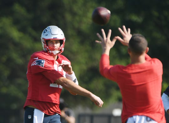 Tom Brady works out during Monday's joint practice with the Detroit Lions.