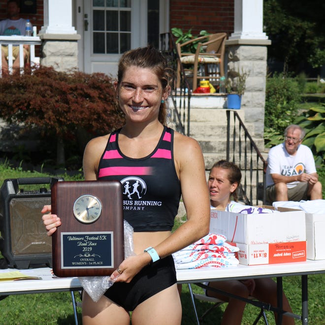 Lancaster's Sammie Zishka defended her women's title in the 28th annual Baltimore Festival 5K run with a time of 17:32.