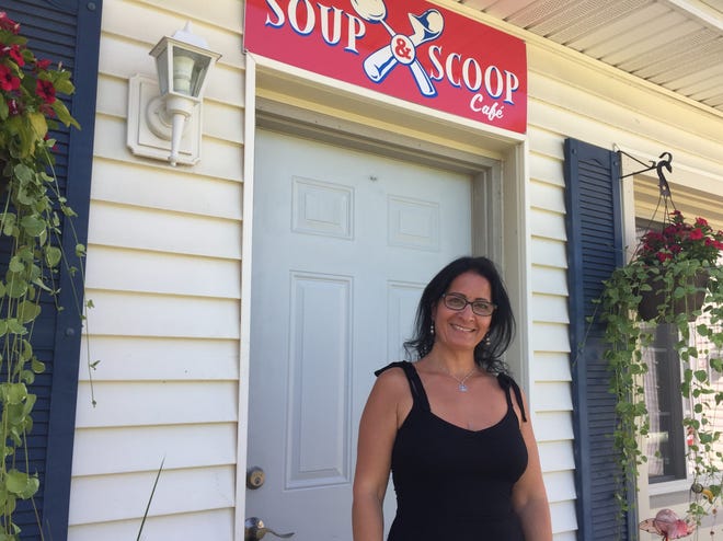 Susie Ansara stands outside her new Mediterranean cuisine inspired restaurant Soup & Scoop Café, Friday, Aug. 2, 2019. The eatery, café and ice cream parlor is set to open this Friday in Green Oak Township.
