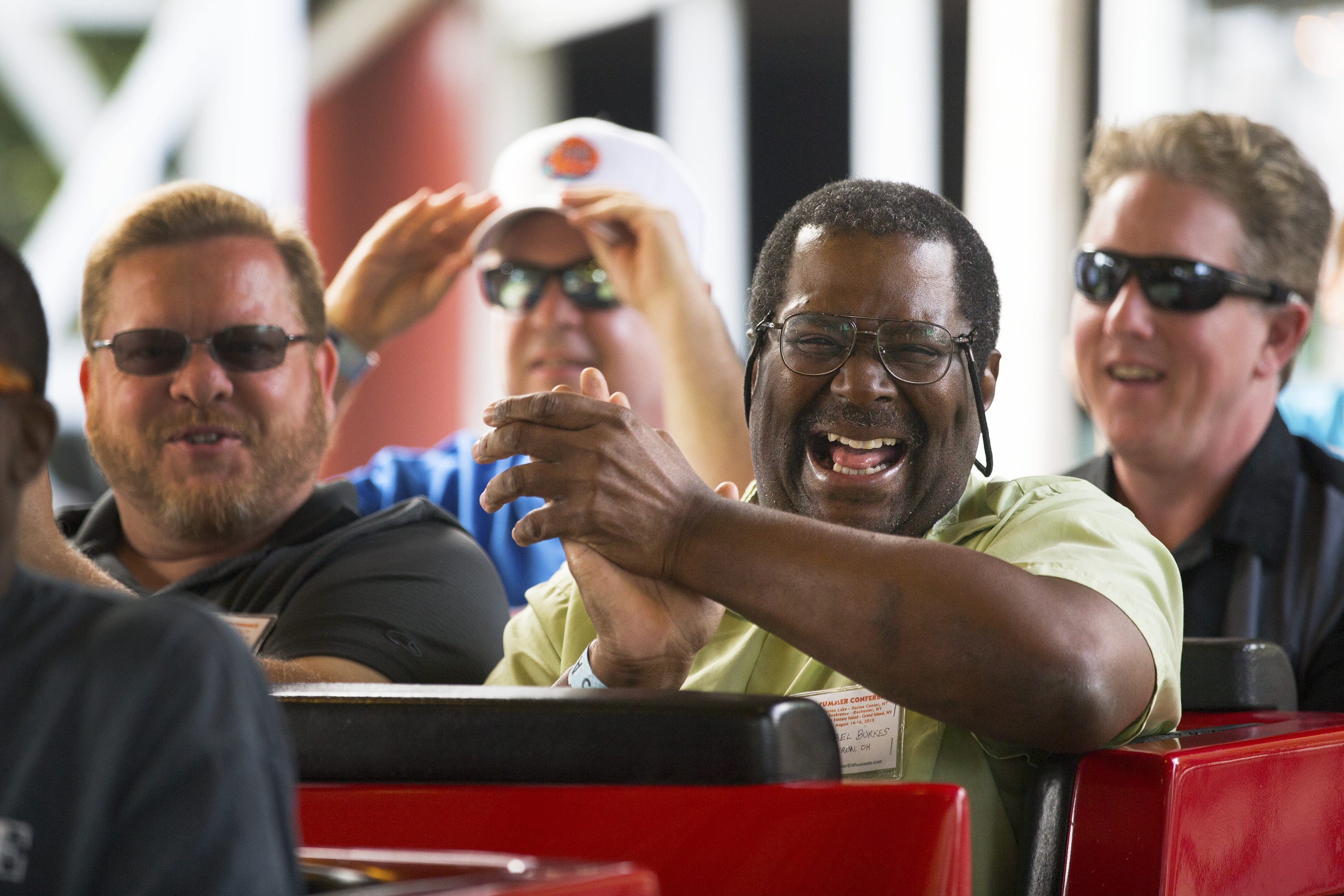 American Coaster Enthusiast Michael Burkess of Akron, Ohio laughs  after riding the Jack Rabbit at Seabreeze Amusement Park.  August 15, 2015.