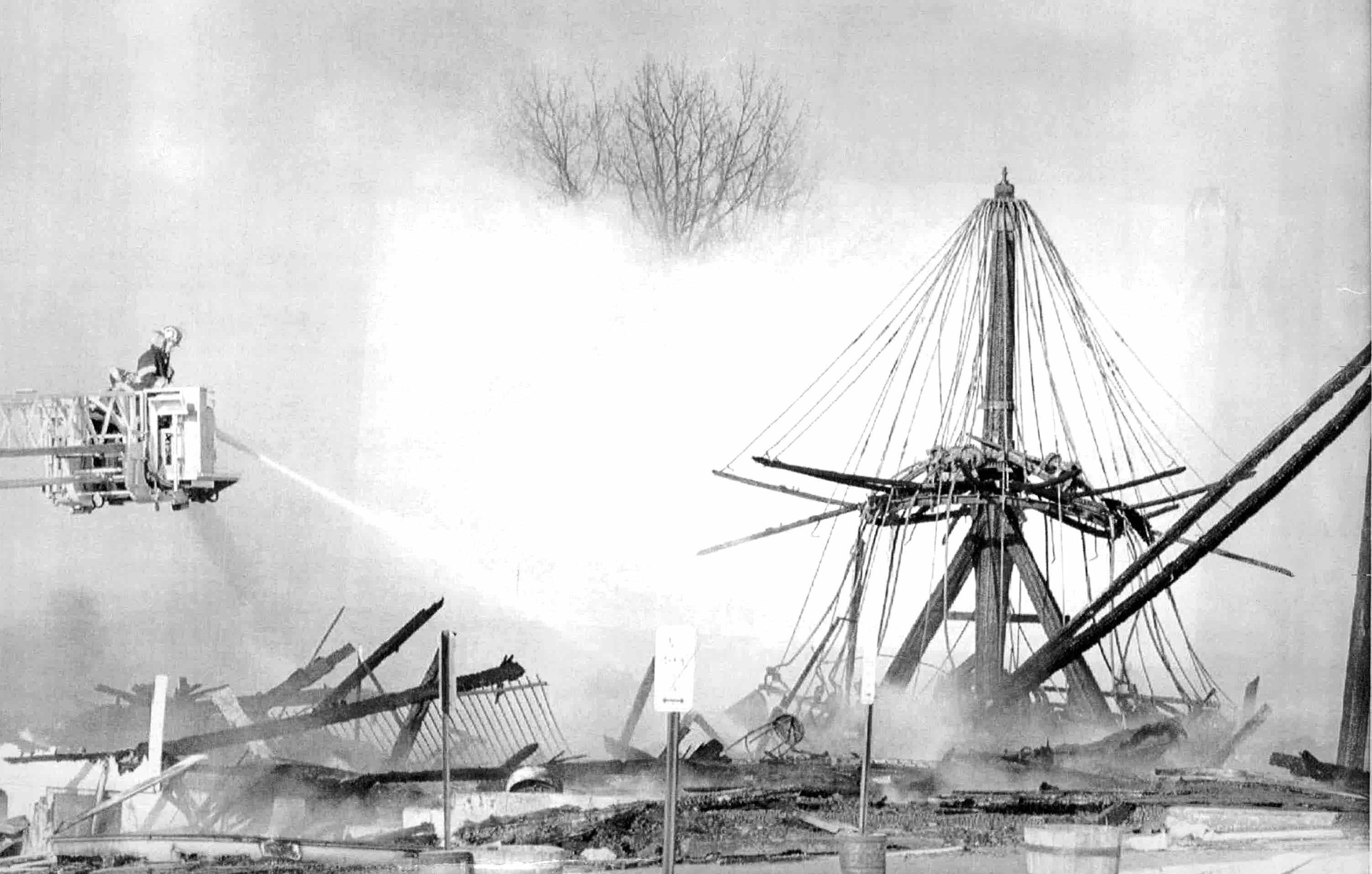 Firefighters pump water onto the skeletal remains of the Seabreeze Carousel following a March 31, 1991 blaze at the amusement park. The 79-year-old merry-go-round was the 36th of 85 carousels made by the Philadelphia Tobaggan Co. and was brought to Seabreeze in 1926.