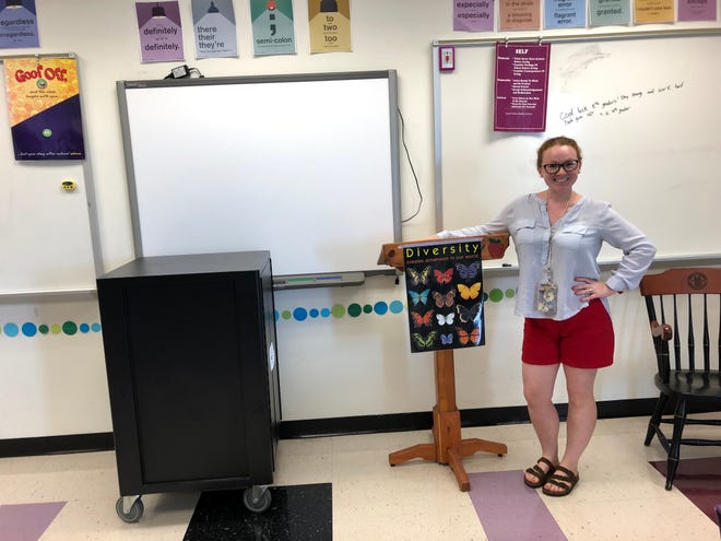 Kate Collins Middle School English teacher Jessica Sobelman stands in her classroom the day before the first day of the 2019-20 school year.