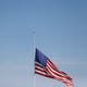 The flag is flown at half-staff outside of Camping World of El Paso Monday, Aug. 5, after the Walmart shootings Saturday, Aug. 3, 2019, in El Paso, Texas.