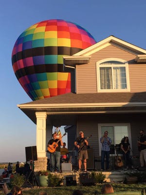 Hot air balloon rides were an attraction of the 2017 Porchfest celebration in North Liberty’s Arlington Ridge neighborhood.