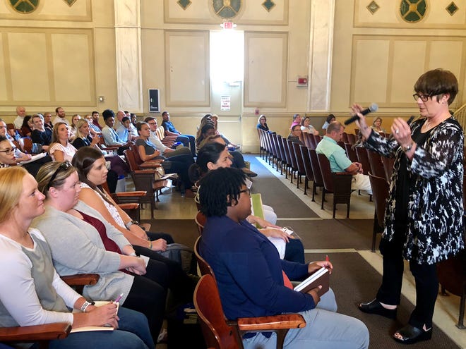 Annette Breaux, motivational speaker, educator and author of "101 Answers for New Teachers," speaks to about 220 teachers Tuesday at the Lafayette Parish School System's new teacher orientation.