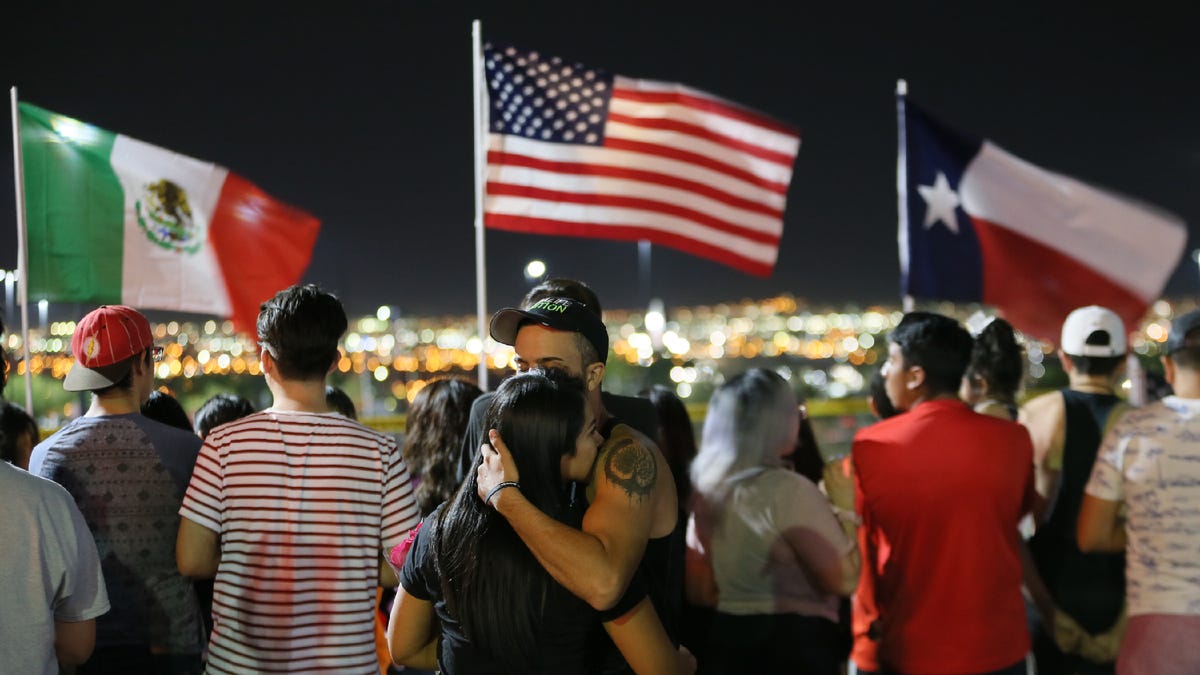 The memorial outside the Walmart in El Paso, Texas, continues to grow Monday, Aug. 5, 2019, as more El Pasoans arrive to leave flowers, pray and light a candle for the victims of the attack at Walmart on Saturday, Aug. 3, 2019, that claimed 22 lives and left 25 others injured.