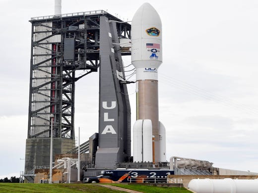 Photographers set up remote cameras in advance of tonight's launch of a United Launch Alliance Atlas V rocket from Cape Canaveral Air Force Station. The rocket is carrying the AEHF 5 communications satellite for the U.S. military. Mandatory Credit: Craig Bailey/FLORIDA TODAY via USA TODAY NETWORK