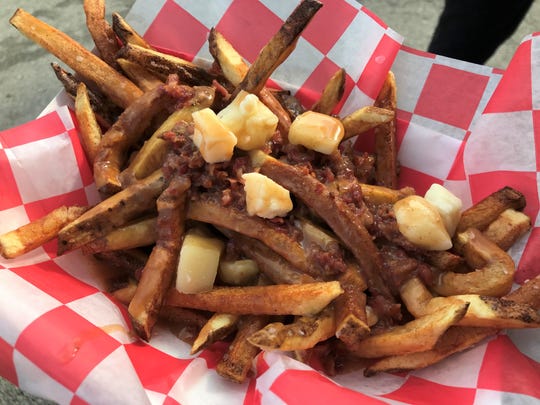 What is poutine, and why do Canadians love it so?