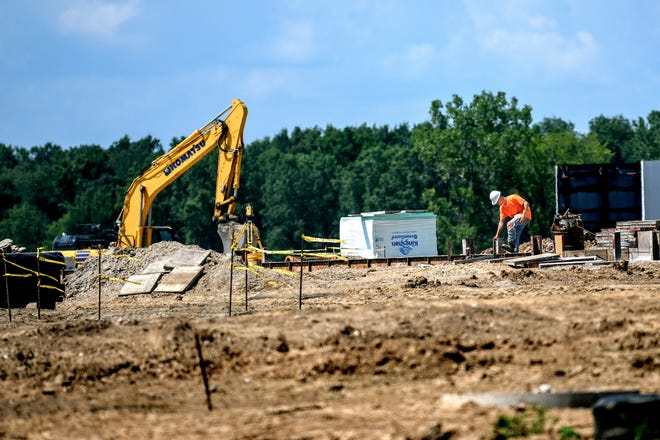 The construction site of a Love's Travel Stop photographed on Tuesday, Aug. 7, 2019, in Waterton Township. The new truck stop at the northwest corner of the intersection of Francis Road and W. Grand River Highway is near a Pilot Flying J Travel Center.