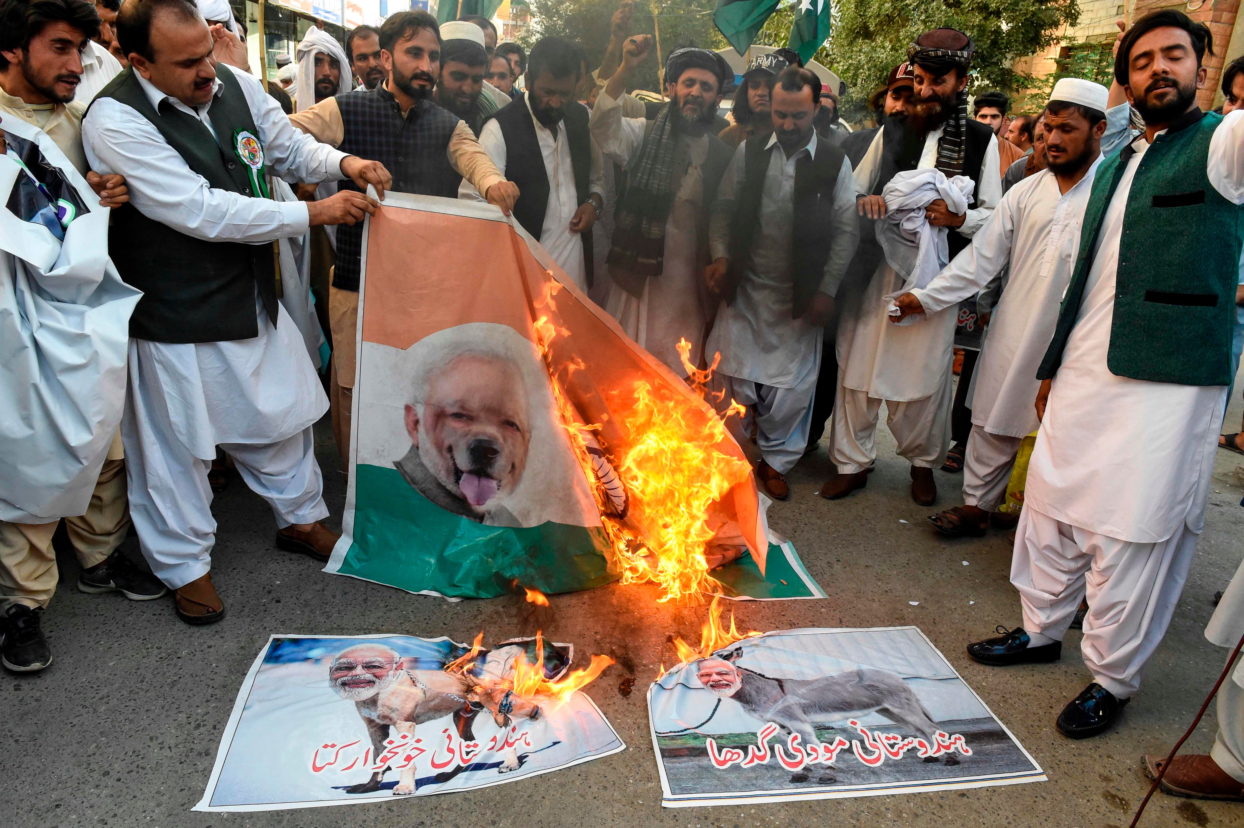 Indian troops lock down its only Muslim-majority state, Pakistan warns of war