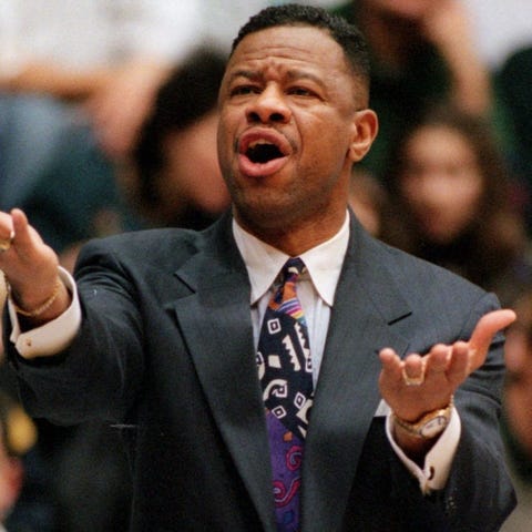 Ricky Byrdsong, shown coaching at Northwestern,...