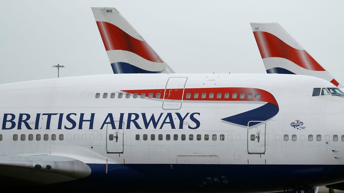 This Jan. 10, 2017 file photo, British Airways planes are parked at Heathrow Airport in London.
