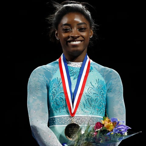 Simone Biles smiles at the 2018 U.S. Gymnastics...