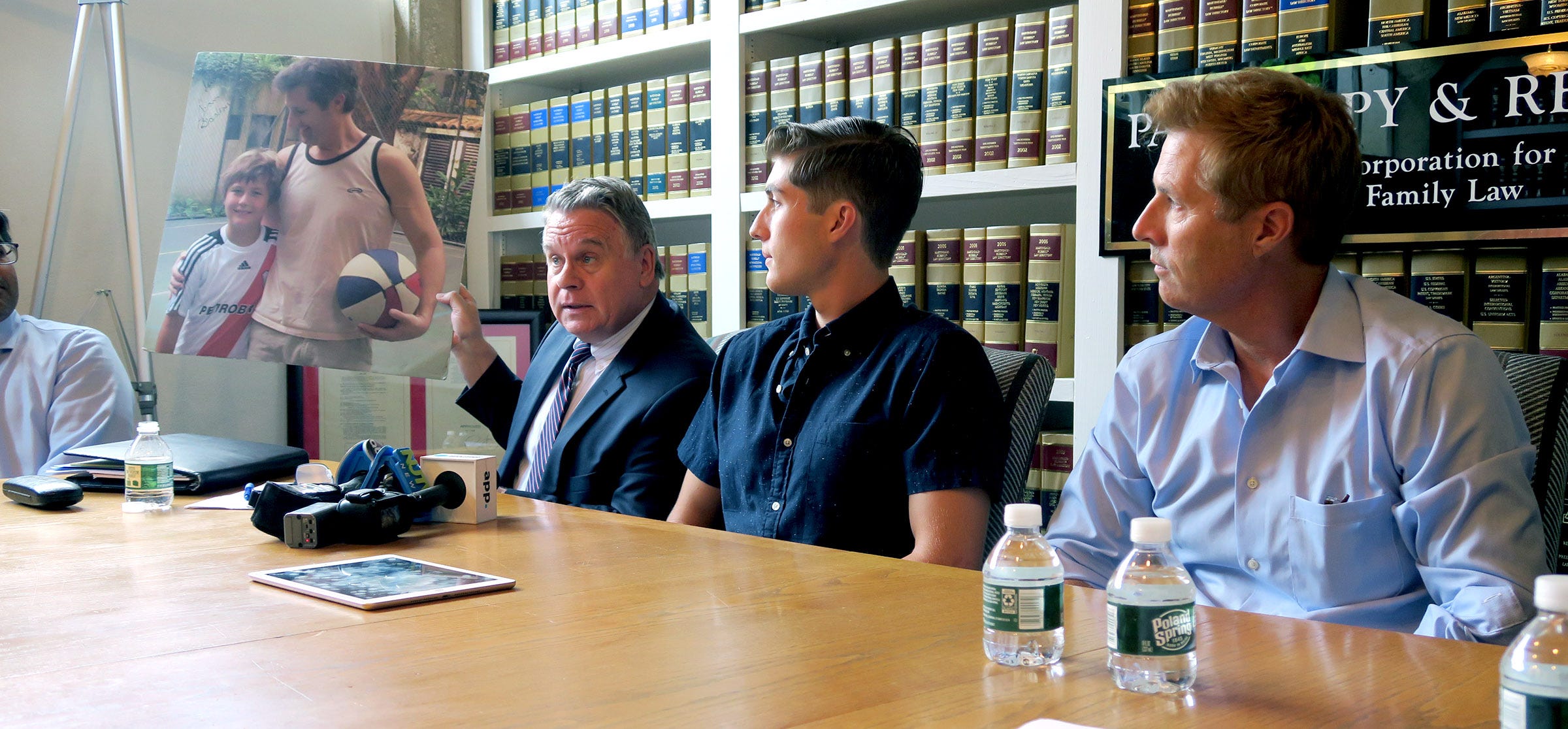 U.S. Congressman Chris Smith with Sean and David Goldman in 2019.