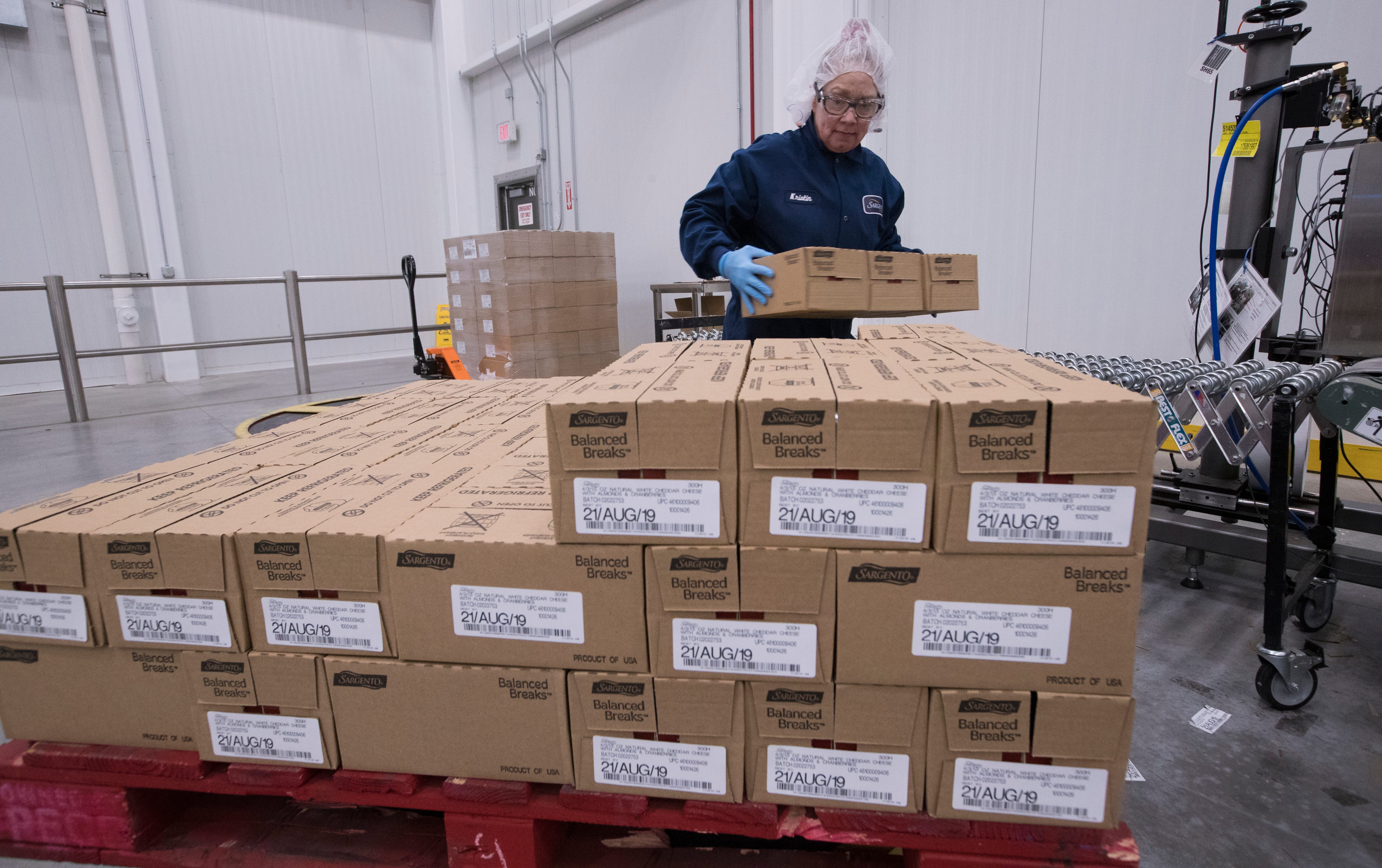 Kristin Geary works on a line packaging Balanced Breaks snacks Sargento Foods Inc.