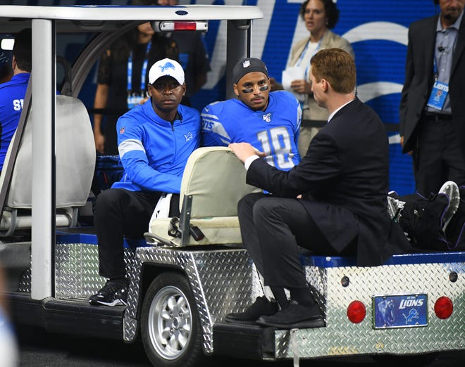 Lions wide receiver Jermaine Kearse is taken off the field after suffering a leg injury in the first quarter on Thursday.