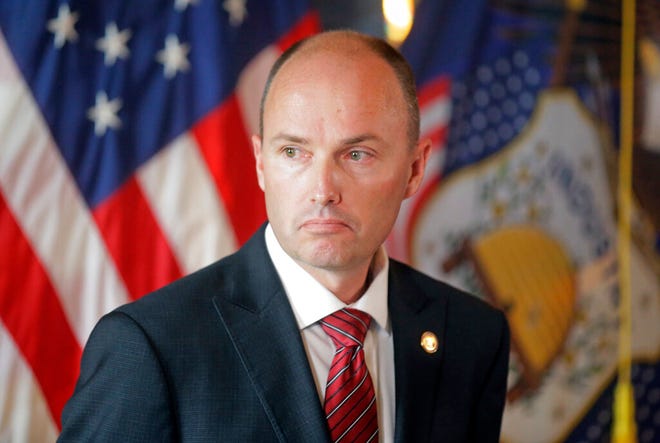 FILE - In this May 19, 2017, file photo, Utah Lt. Gov. Spencer Cox looks on during a news conference at the Utah State Capitol, in Salt Lake City. Voter fraud is rare in the state and typically involves parents submitting ballots for children who are away from home serving missions for The Church of Jesus Christ of Latter-day Saints, the state's lieutenant governor said. Cox said voter fraud is usually the result of a misunderstanding of election laws, The Salt Lake Tribune reported Thursday, Aug. 8, 2019. (AP Photo/Rick Bowmer, File)