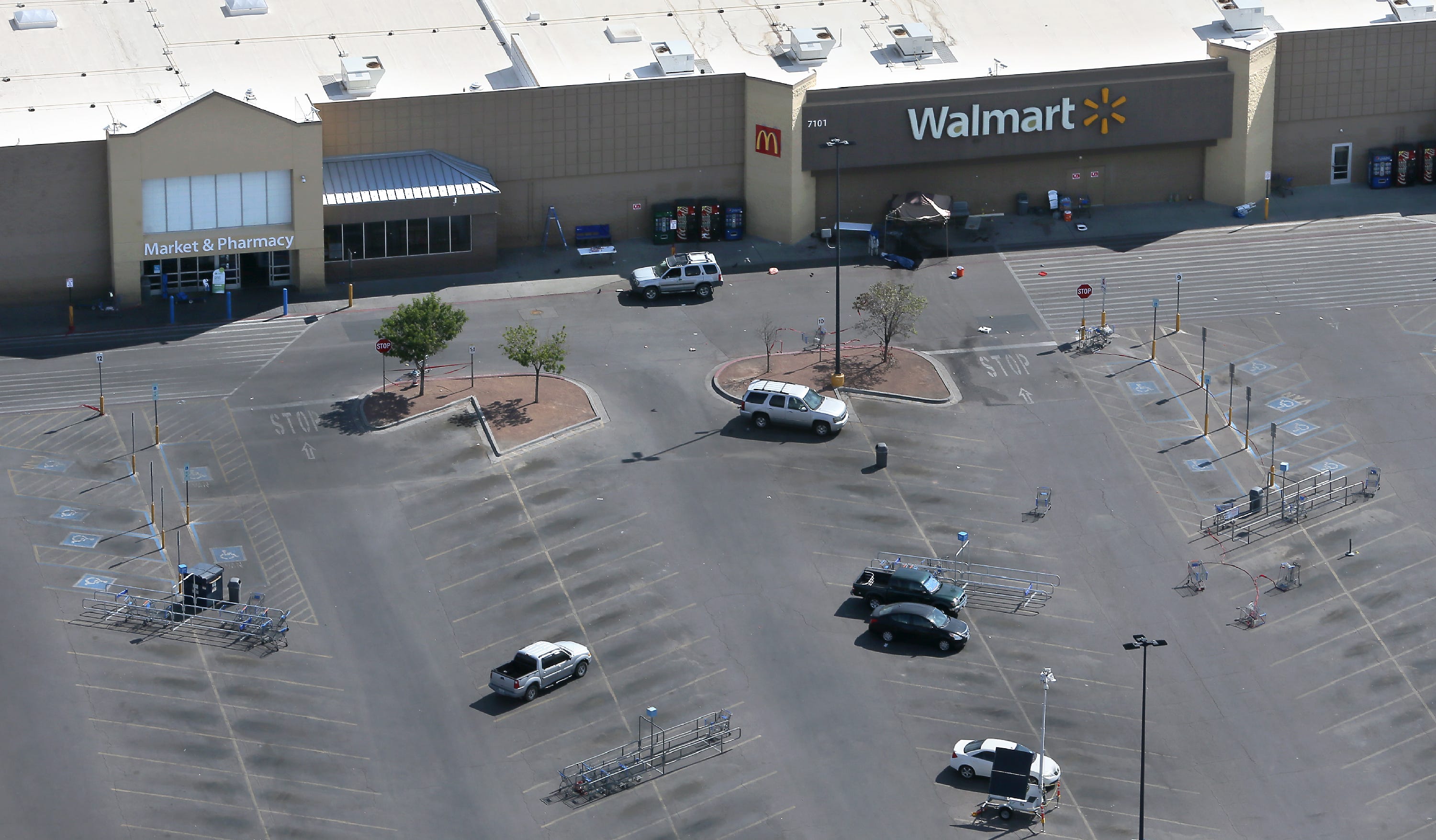 Aerial photographs of Walmart near Cielo Vista Mall where a shooting that killed 22 and wounded 25 others happened Saturday, Aug. 3, 2019. Some vehicles still remain at the crime scene. The gunman walked from the middle of the parking lot straight up the middle lane, right, shooting a man at the cart return, right center, he then proceeded to fire at the location directly under the Walmart sign, where the EP Fusion youth soccer team was holding a fundraiser. He then walked to the entrance at left and opened fire inside the building.