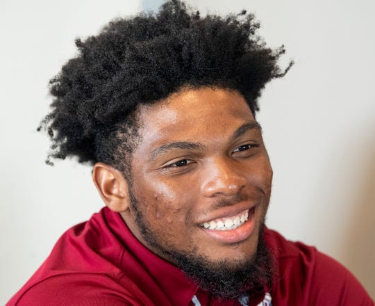 Troy running back B.J. Smith (26) talks with reporters as Troy University football media day is held on the campus in Troy, Ala., on Saturday August 10, 2019.