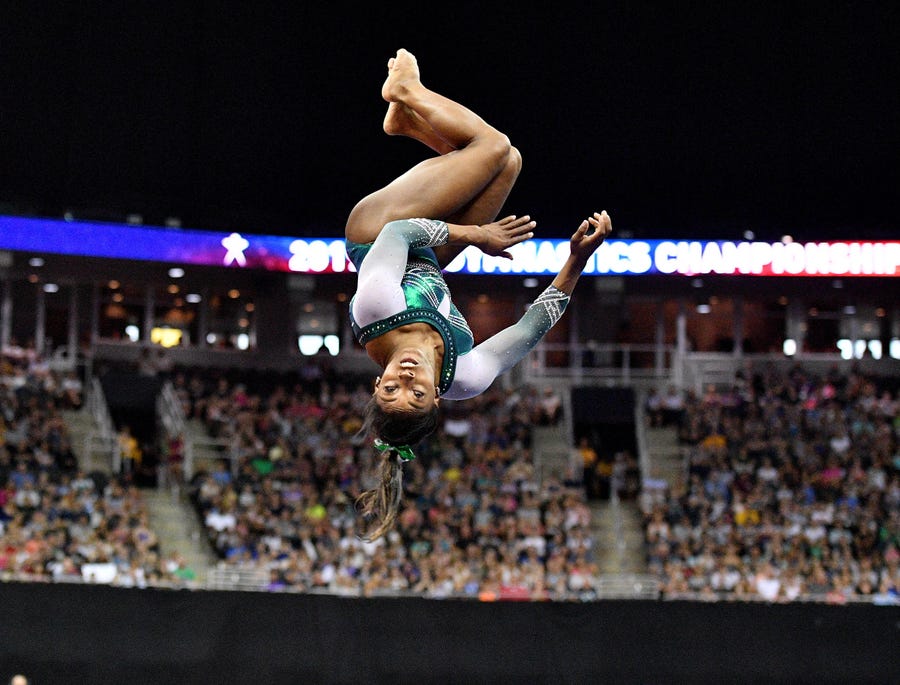 Simone Biles performs her floor routine.