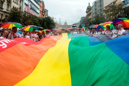 People deploy a giant rainbow flag during the 9th gay pride event in the Czech capital Prague on Aug. 10, 2019. About 30,000 people took part in the Prague Pride Parade of the LGBT community while a similar march in neighboring Poland went smoothly despite concerns.