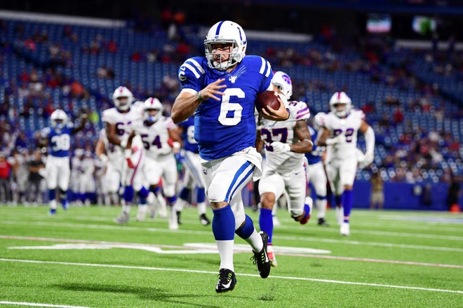 Indianapolis Colts quarterback Chad Kelly runs for a touchdown during the second half of an NFL preseason football game against the Buffalo Bills, Thursday, Aug. 8, 2019, in Orchard Park, N.Y. (AP Photo/David Dermer)