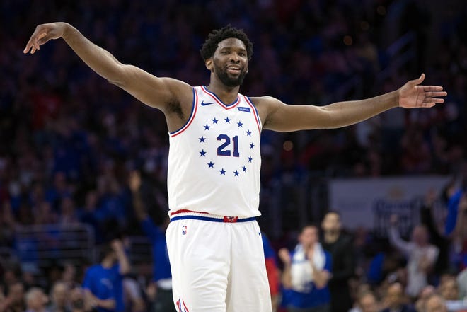 Center Joel Embiid (21) will be leading the Philadelphia 76ers into action when the team hosts Milwaukee on Christmas.