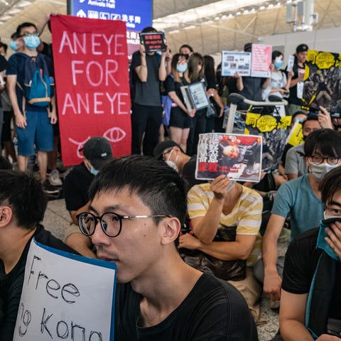 Protesters occupy the departure hall of the Hong...
