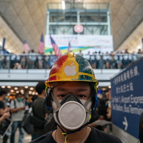 Protesters occupy the arrival hall of the Hong...