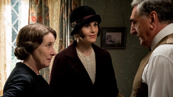 Lady Mary (Michelle Dockery, center) readies for a