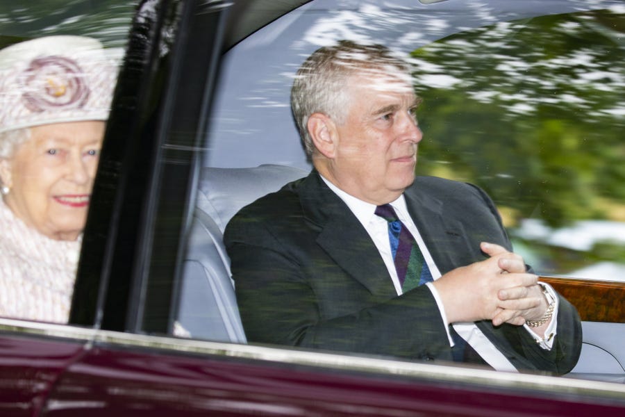 Queen Elizabeth II and Prince Andrew are driven from Crathie Kirk Church following Sunday service on Aug. 11, 2019, near Balmoral where the royals spend summer holidays.