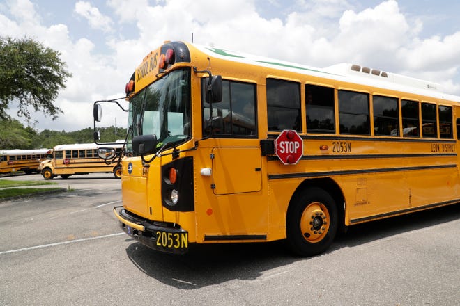 A bus leaves for the afternoon route at the Conner-Lakes Leon County Schools Bus Compound Tuesday, August 13, 2019. 