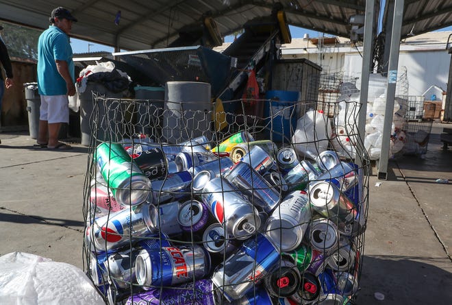 People recycle their cans and plastics at Apple Markett Recycling Center in Indio, August 13, 2019. 
