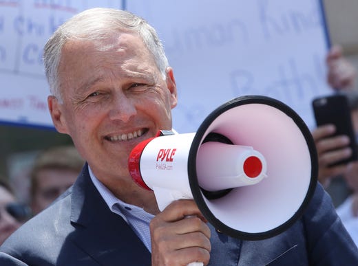 Democratic presidential candidate and Washington Governor Jay Inslee joins immigration activists to protest President Trumps immigration positions on July 12, 2019 in Washington, DC.