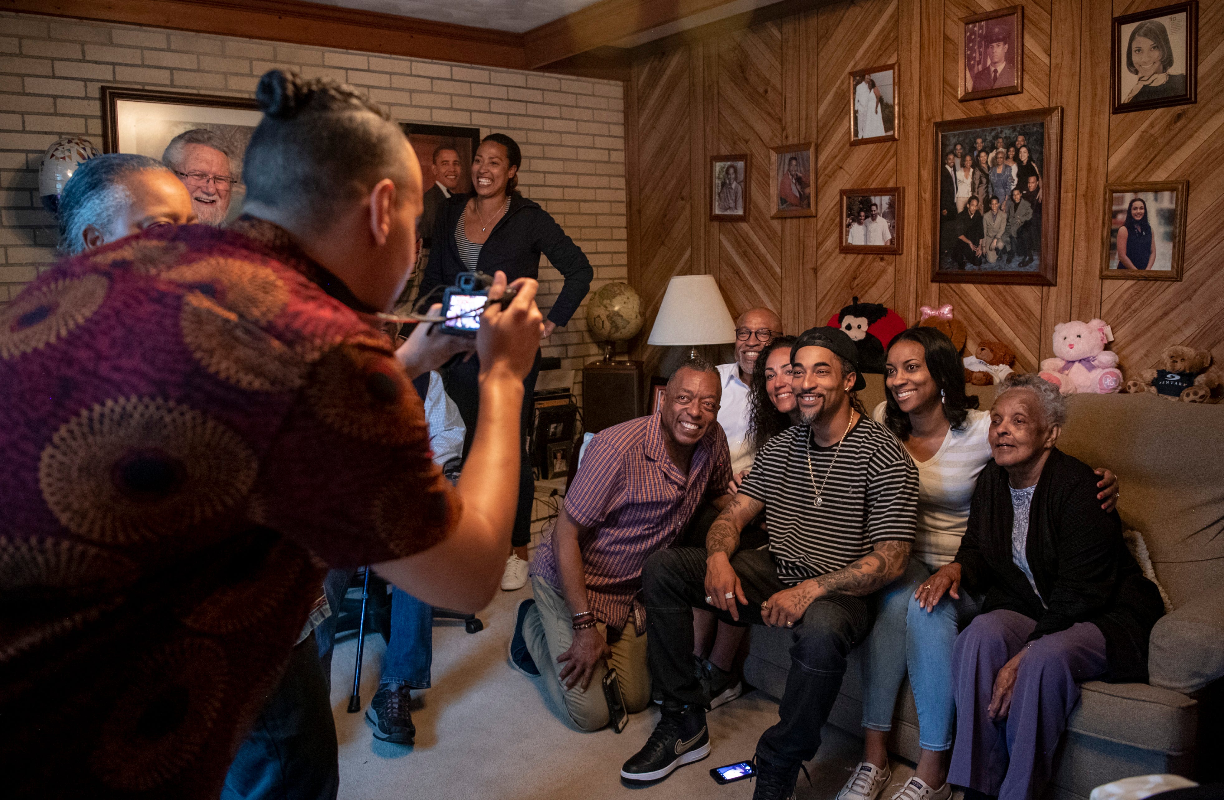 The Tucker family gather for photos during the 88th birthday of Carol Tucker Jones in Hampton, Va. on Sunday, March 31, 2019.